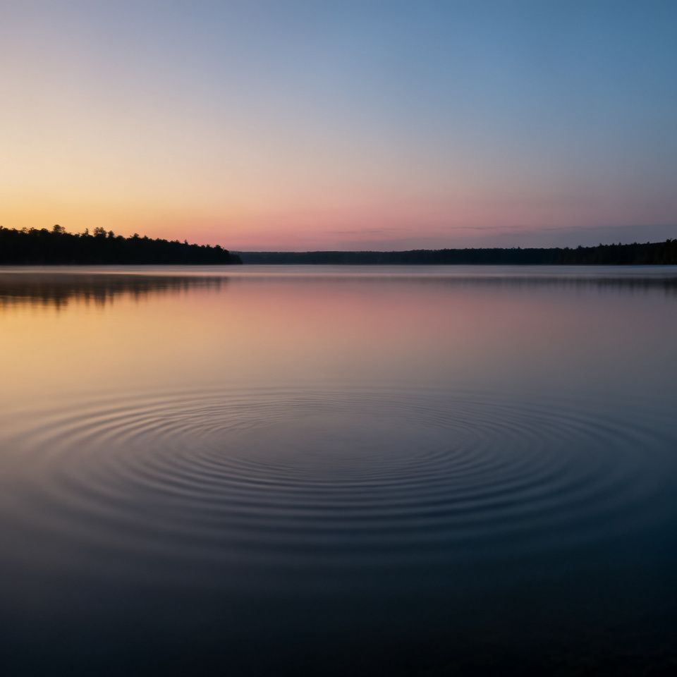 A calm lake at dusk symbolizing stable inner peace and quiet self-acceptance